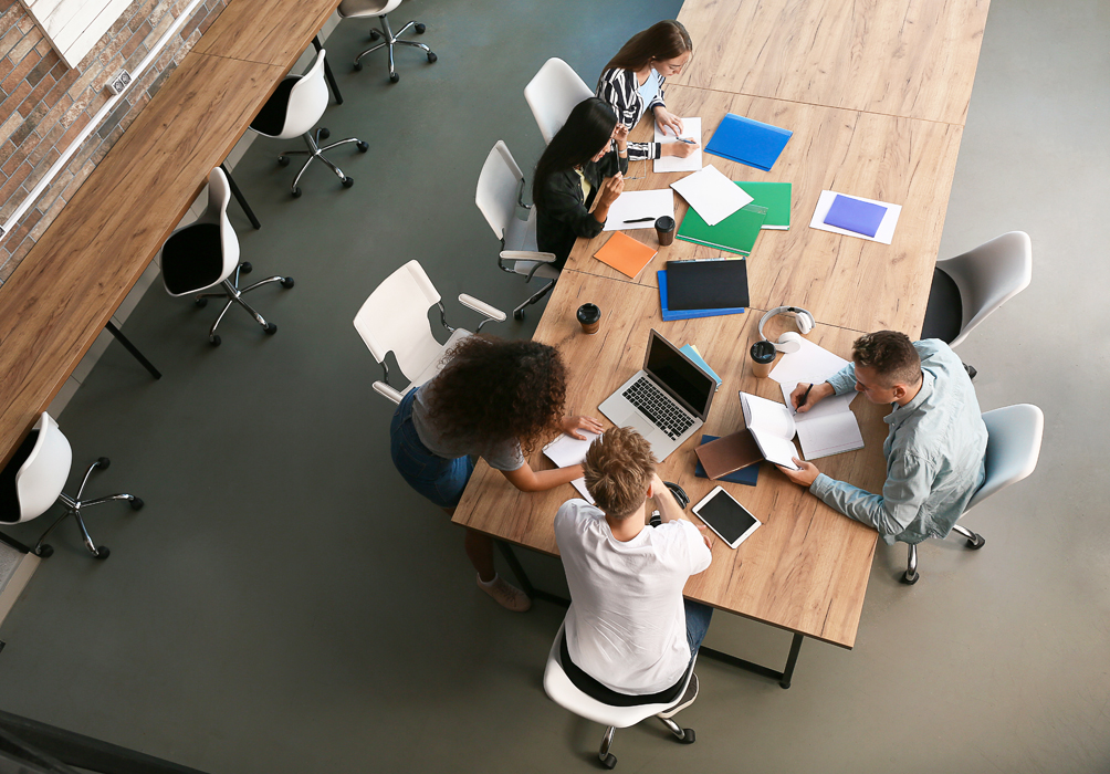 Group of students preparing for exam in university, top view