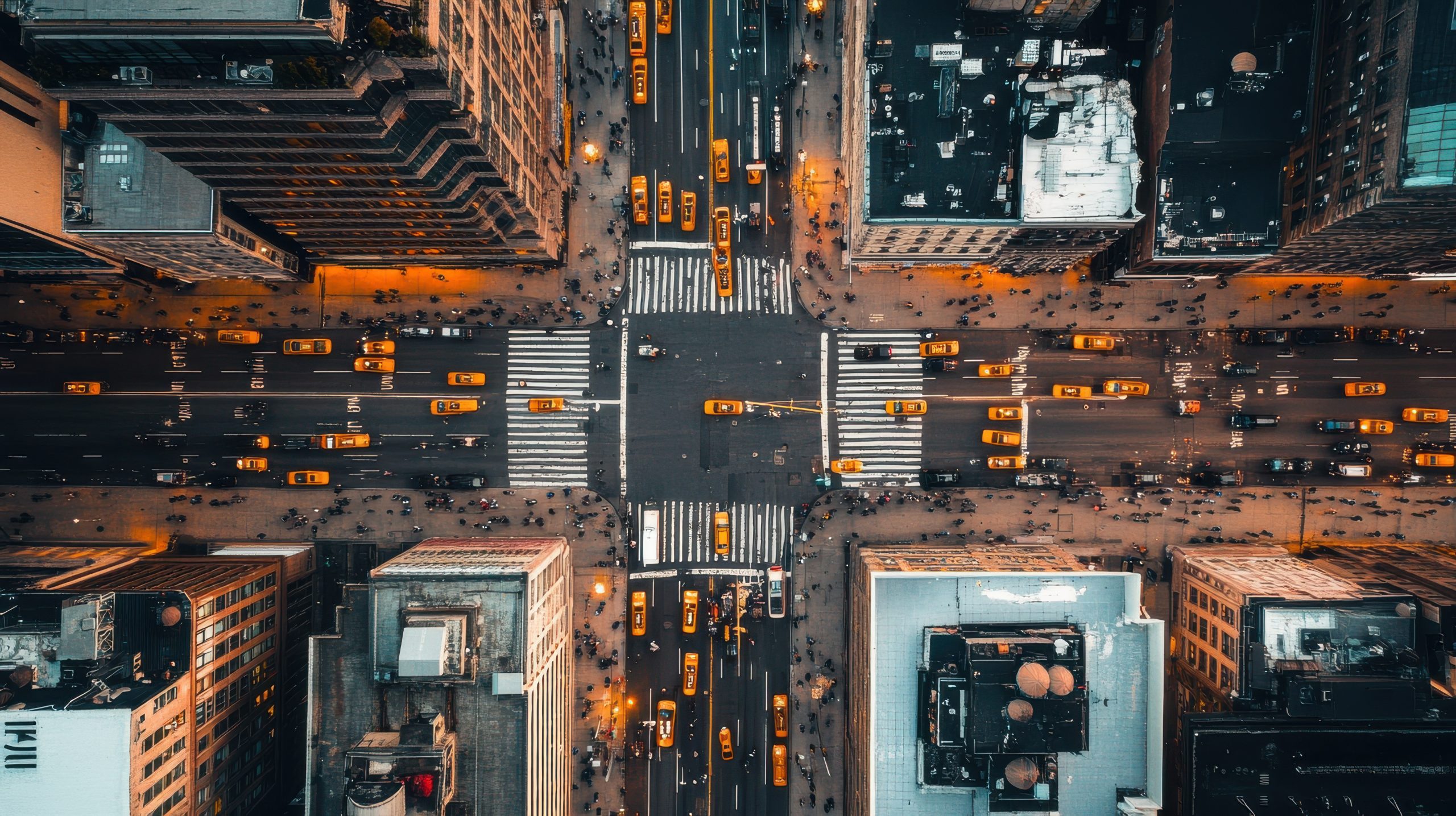 Aerial view of busy intersection with yellow taxis in new york city