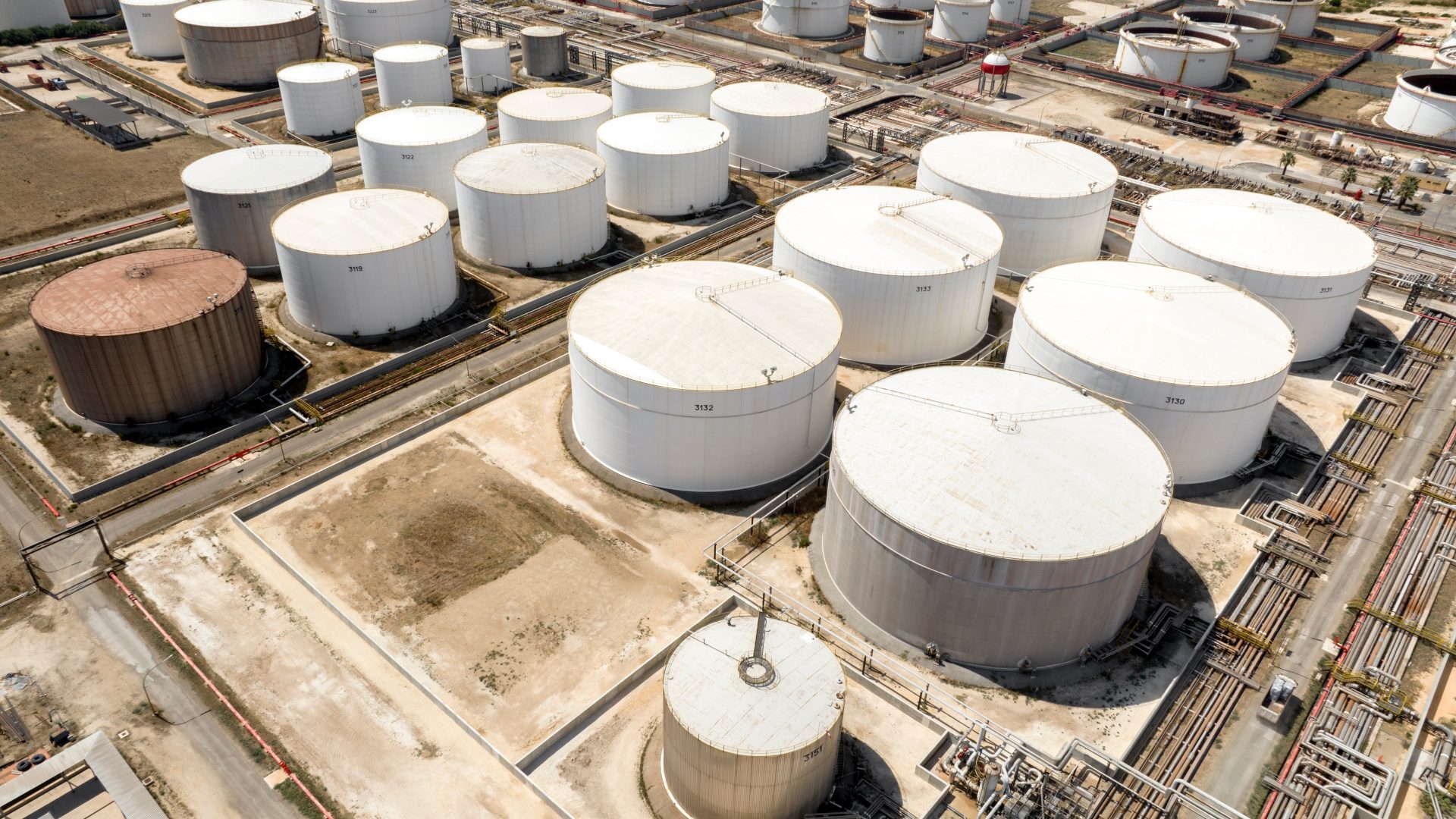 Aerial view of cylinder tanks of an industrial area.