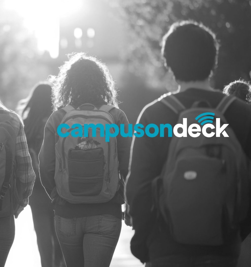 A group of high school students walking to class with backpacks,