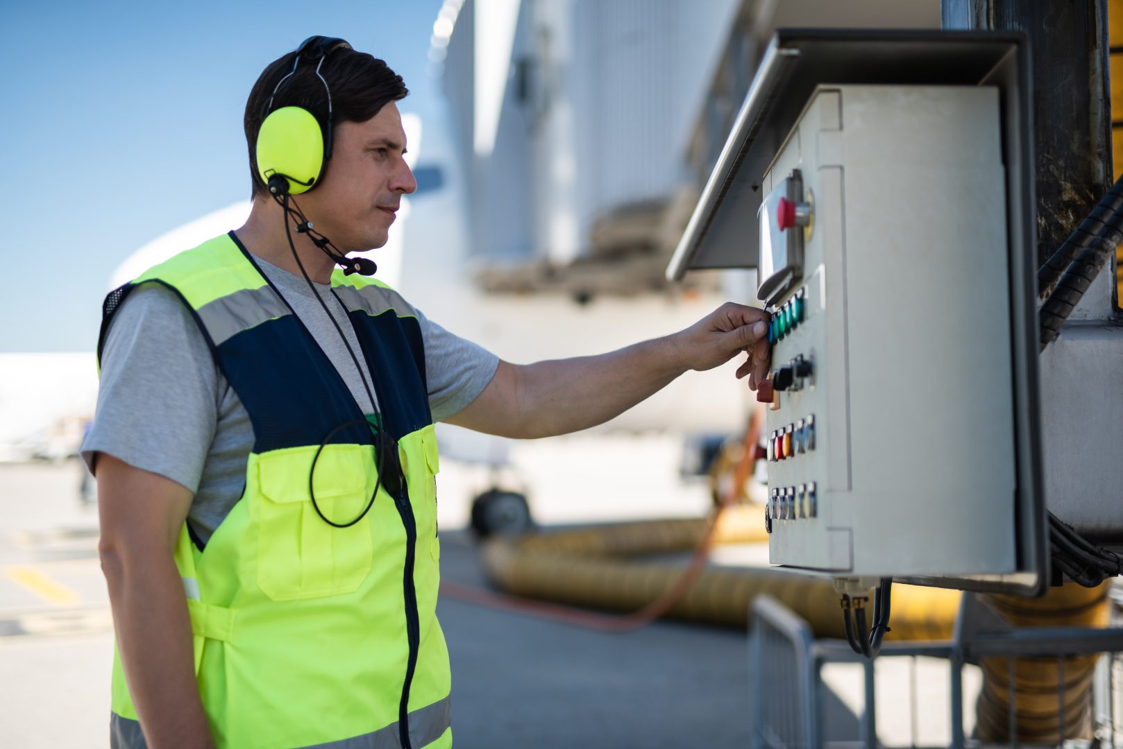 Airport mechanic checking technical equipment