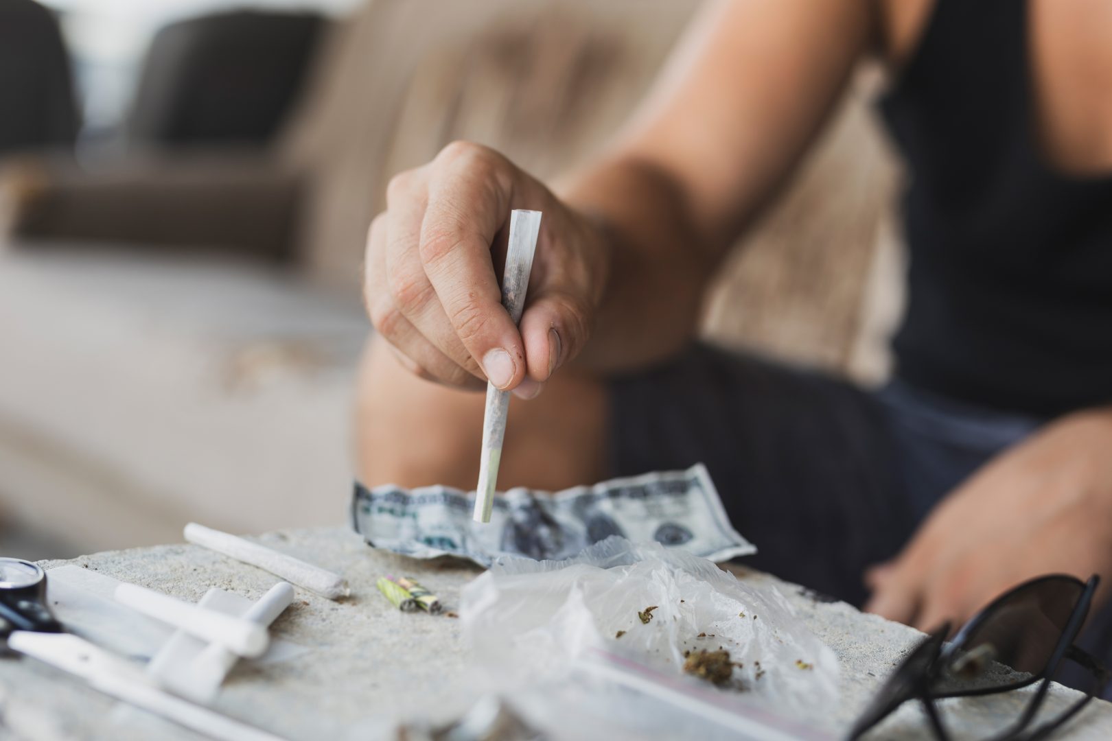 Man rolling a joint