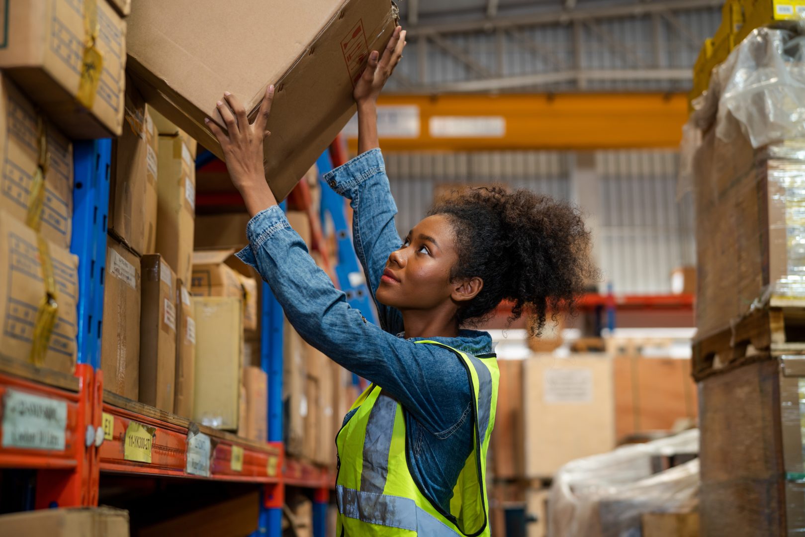 Women warehouse staff worker manage factory products goods and s