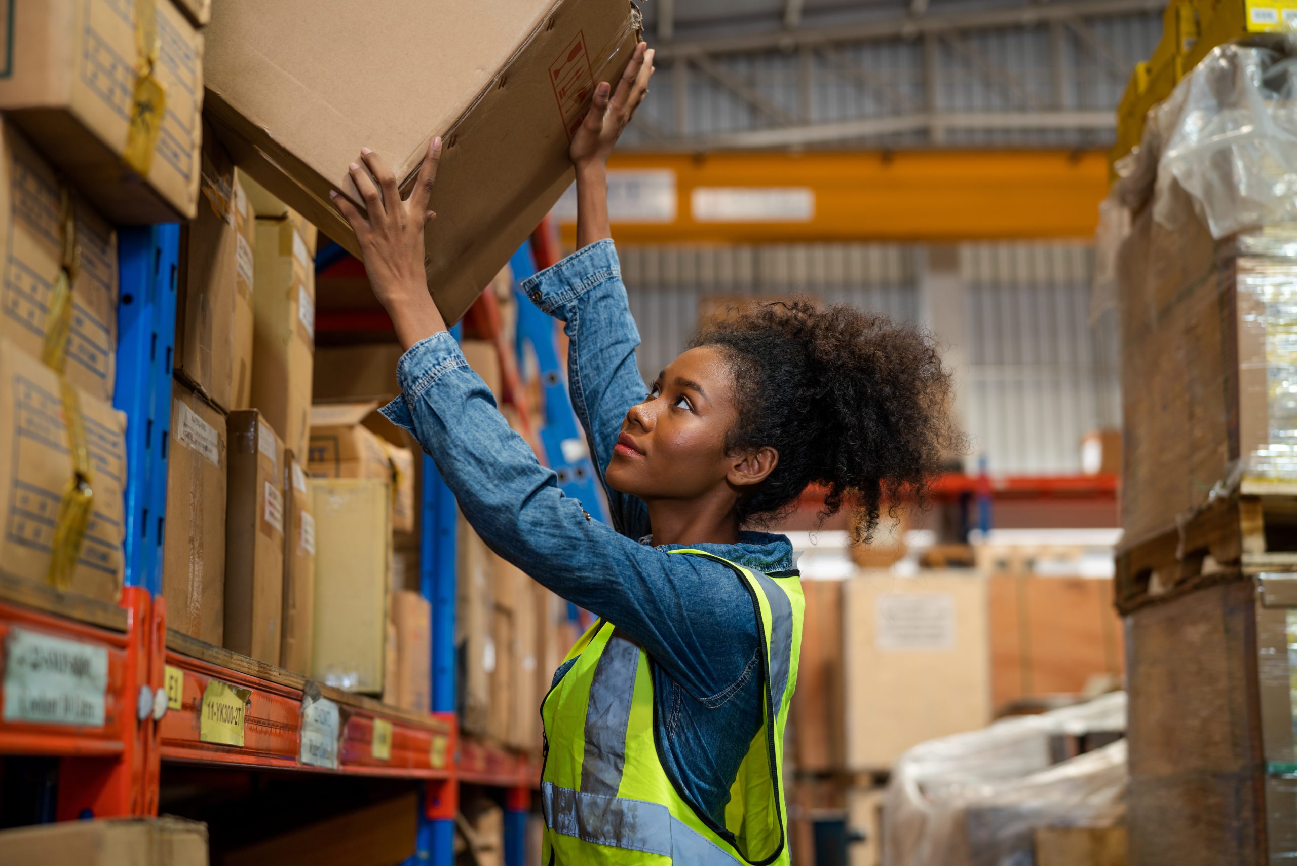 Women warehouse staff worker manage factory products goods and s